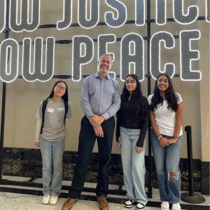 Lucinda with school board president Sam Davis and other Youth Leaders